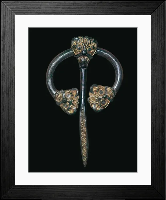 Framed Print : Viking gilded bronze dress fastener, 9th century Framed Print : Viking gilded bronze dress fastener, 9th century