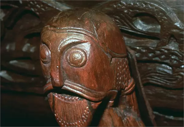 Carved head detail from a cart in the Oseburg Viking ship burial, 9th century