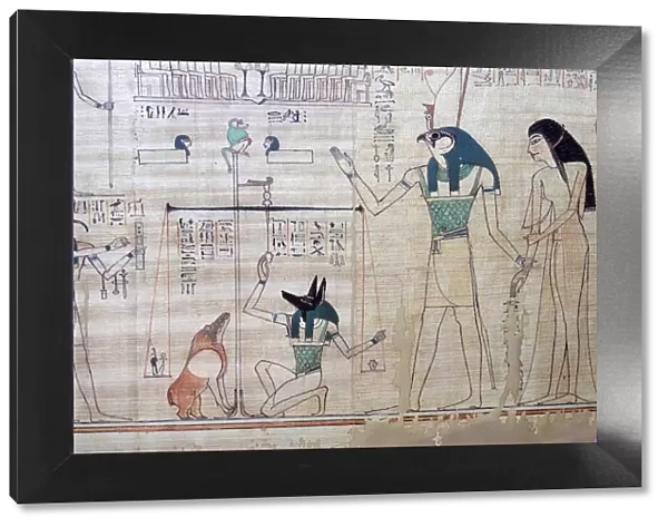 Weighing of the heart of the deceased against the feather of truth from the Egyptian Book of the Dea