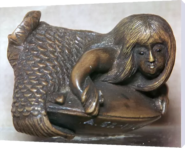 Japanese Netsuke of a mermaid on a clam, 18th century