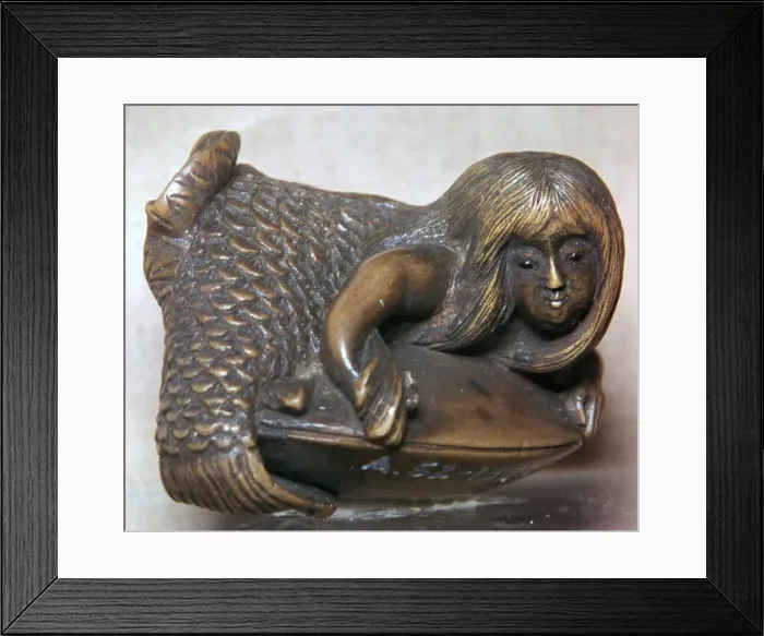 Framed Print : Japanese Netsuke of a mermaid on a clam, 18th century Framed Print : Japanese Netsuke of a mermaid on a clam, 18th century