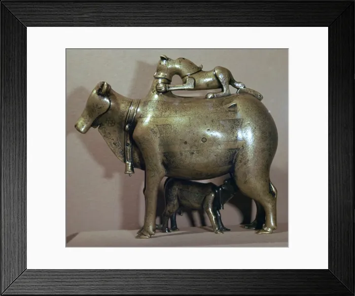 Framed Print : Cast bronze zebu-cow suckling her calf while a lion attacks her back, 13th century Framed Print : Cast bronze zebu-cow suckling her calf while a lion attacks her back, 13th century