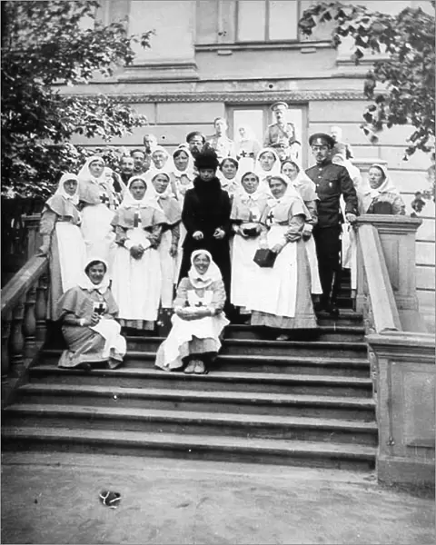Dowager Empress Maria Feodorovna of Russia with nurses outside a hospital, Russia, 1916