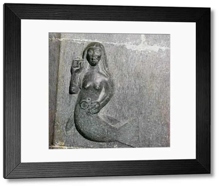 Framed Print : Mermaid on the chancel arch of Clonfert Cathedral, 12th century Framed Print : Mermaid on the chancel arch of Clonfert Cathedral, 12th century