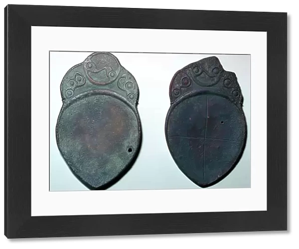 Pair of bronze ritual iron age spoons