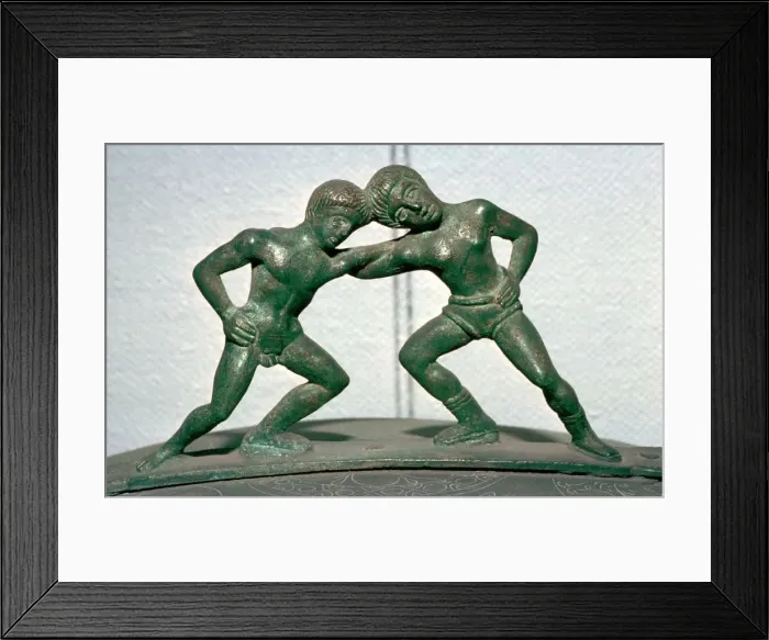 Framed Print : Etruscan bronze handle of a cista, showing Peleus and Thetis wrestling Framed Print : Etruscan bronze handle of a cista, showing Peleus and Thetis wrestling