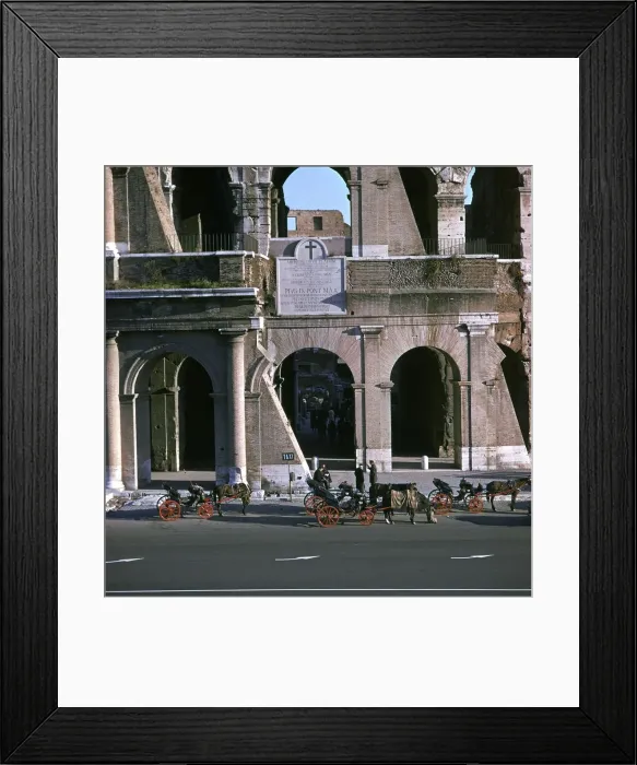 Framed Print : View of the Colosseum with cabs in front Framed Print : View of the Colosseum with cabs in front