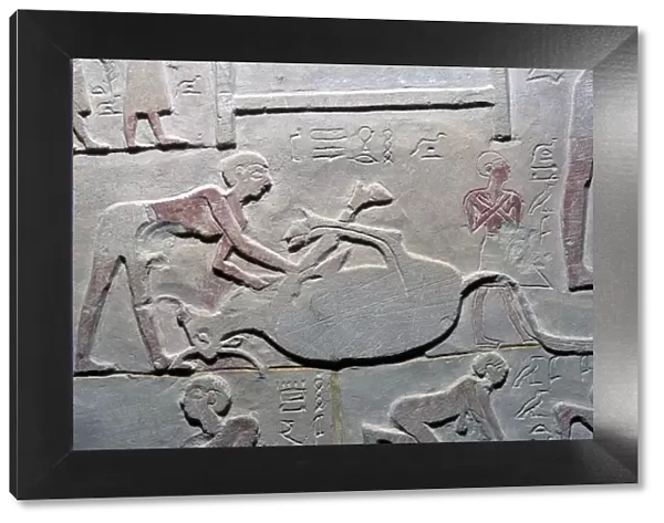 Egyptian relief of the cutting up of a carcass