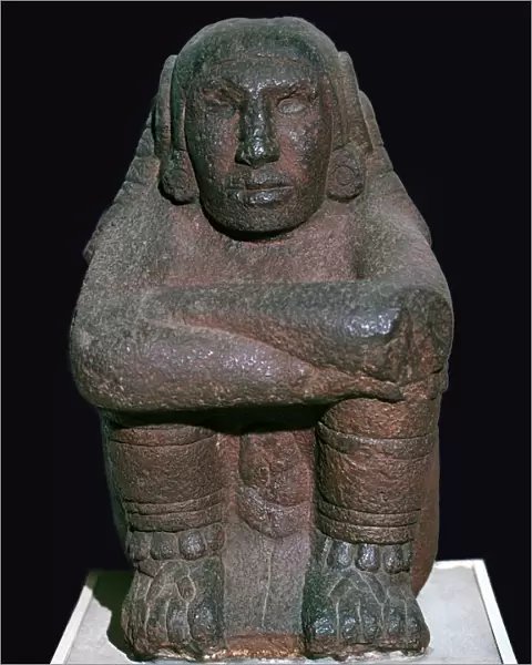 Mayan figurine of a seated god