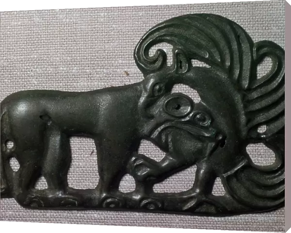 Chinese bronze harness plaque of a tiger and gryphon, 2nd century BC