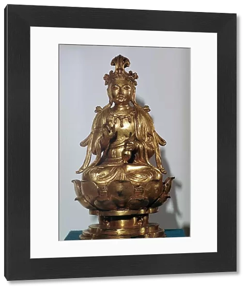 A gilt-bronze statuette of a Bodhisattva on a lotus leaf, 10th century