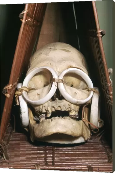Model boat containing a chiefs skull from the Solomon Isles
