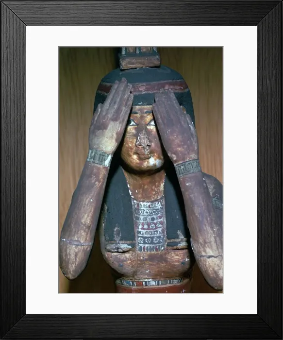 Framed Print : Wooden figure of the Egyptian goddess Nepthys, 15th century Framed Print : Wooden figure of the Egyptian goddess Nepthys, 15th century