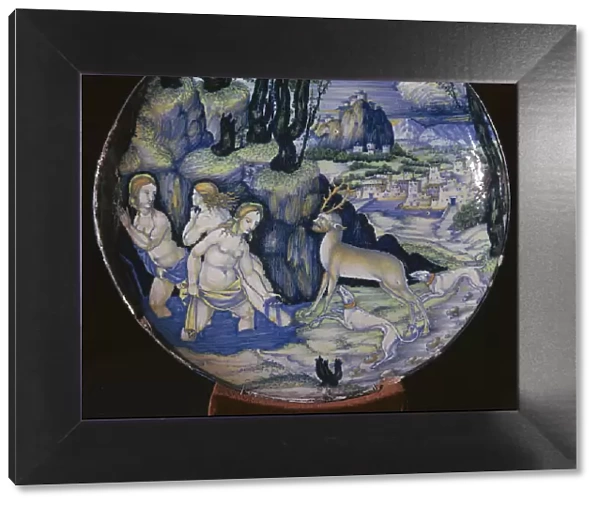 Italian earthenware plate showing Artemis turning Actaeon into a stag