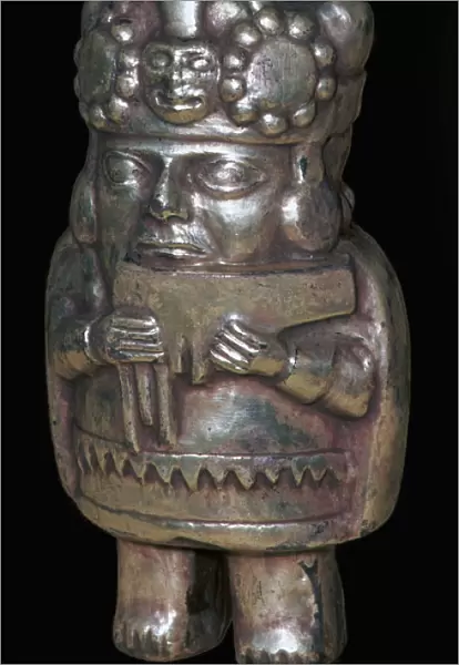Incan silver figure of a man with pan-pipes