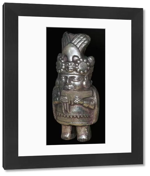 Incan silver figure of a man with pan-pipes