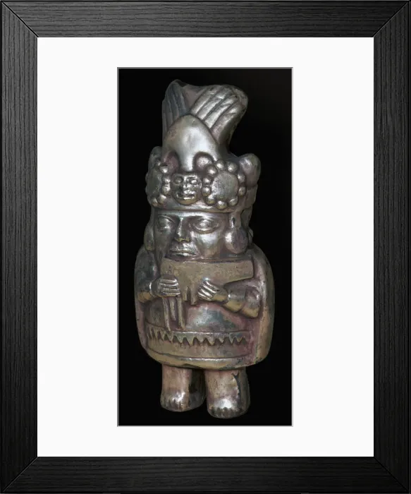 Framed Print : Incan silver figure of a man with pan-pipes Framed Print : Incan silver figure of a man with pan-pipes