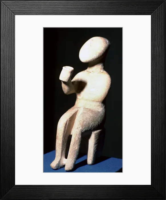 Framed Print : Cycladic marble seated figure holding a cup Framed Print : Cycladic marble seated figure holding a cup