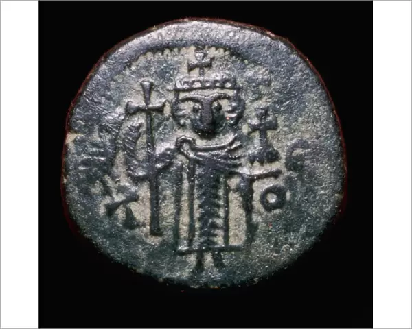 Bronze coin minted at Damascus, 7th century