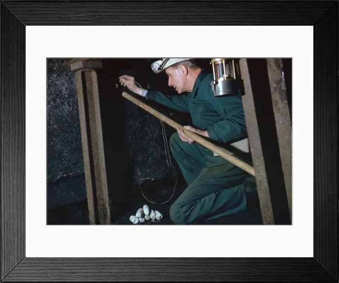Framed Print : The Pit Deputy prepares for shot firing Framed Print : The Pit Deputy prepares for shot firing