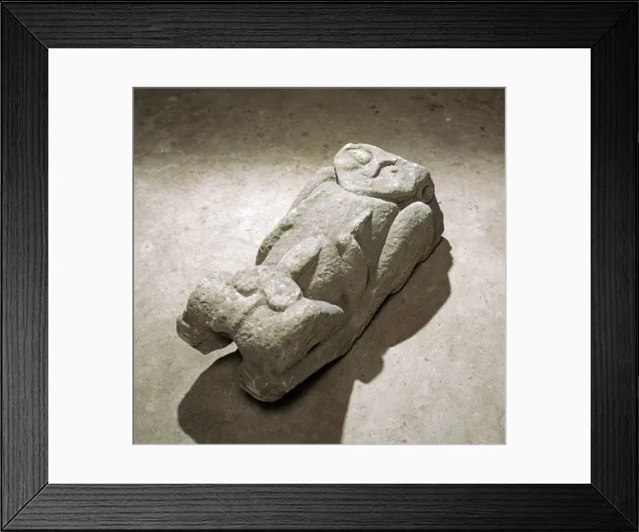 Framed Print : Carved stone figure from Margam Abbey, 12th century Framed Print : Carved stone figure from Margam Abbey, 12th century
