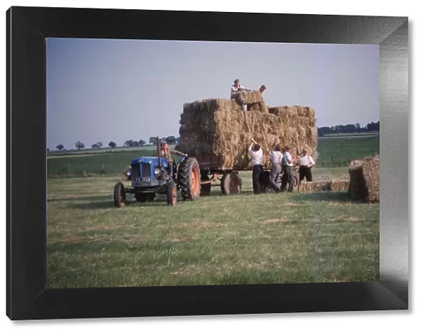 Loading bales of hay, England, c1960. Artist: CM Dixon