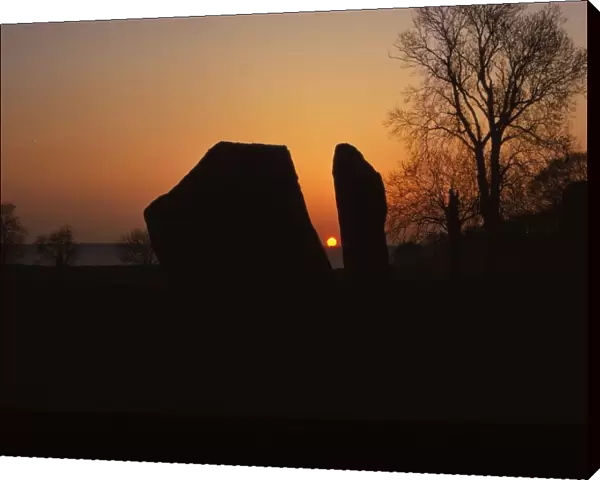 Sunrise on Megalithic Circle, Avebury, Wiltshire, 20th century. Artist: CM Dixon