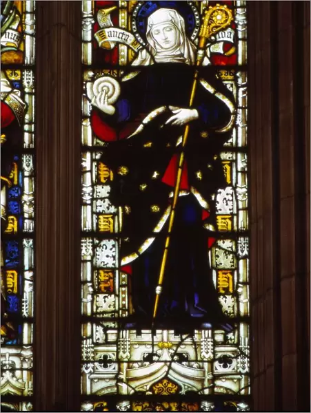 St. Hilda of Whitby holding an ammonite, West window, Hereford Cathedral, 20th century. Artist: CM Dixon
