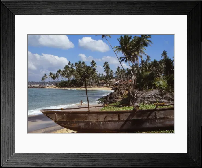 Framed Print : Fishing boat in Village of Hikkaduwa, on West Coast of Sri Lanka, 20th century. Artist: CM Dixon Framed Print : Fishing boat in Village of Hikkaduwa, on West Coast of Sri Lanka, 20th century. Artist: CM Dixon