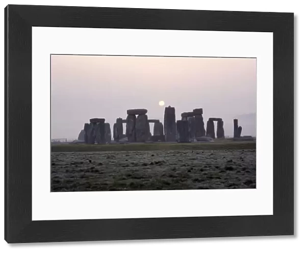 Dawn at Stonehenge, Wiltshire, c20th century. Artist: CM Dixon