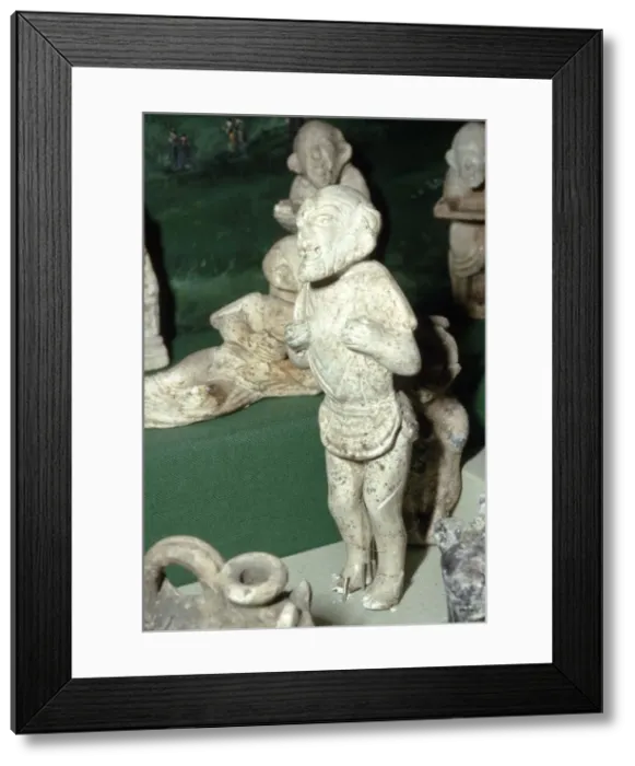 Framed Print : Pipeclay Figure from a Roman Grave, at Colchester, Essex, c60 AD Framed Print : Pipeclay Figure from a Roman Grave, at Colchester, Essex, c60 AD
