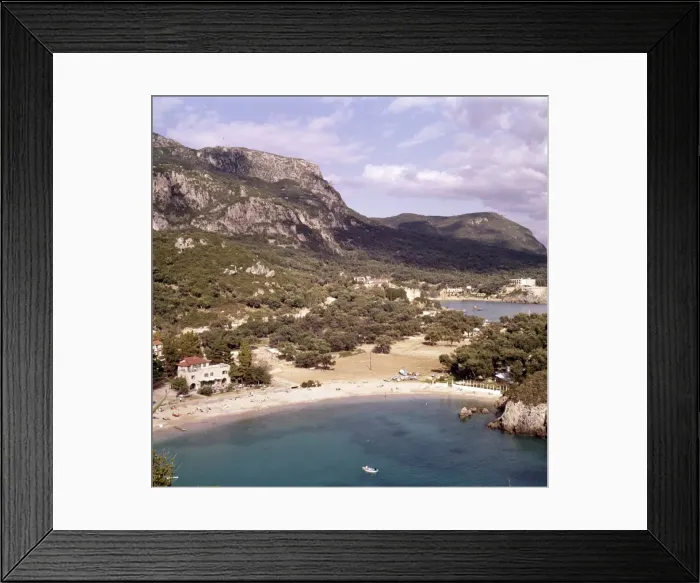 Framed Print : Paleocastritsa, Corfu, from below the monastery, c20th century. Artist: CM Dixon