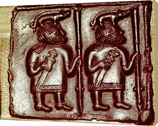 Bronze Matrix for making decorative peaques for helmets, 8th century
