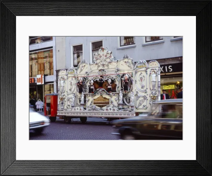 Framed Print : Street Organ in Dutch Town, Holland, 20th century Framed Print : Street Organ in Dutch Town, Holland, 20th century