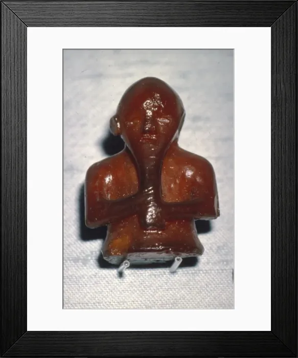 Framed Print : Amber Playing-Piece. Man with Long beard, from Roholte, Denmark, c8th-mid 11th century Framed Print : Amber Playing-Piece. Man with Long beard, from Roholte, Denmark, c8th-mid 11th century