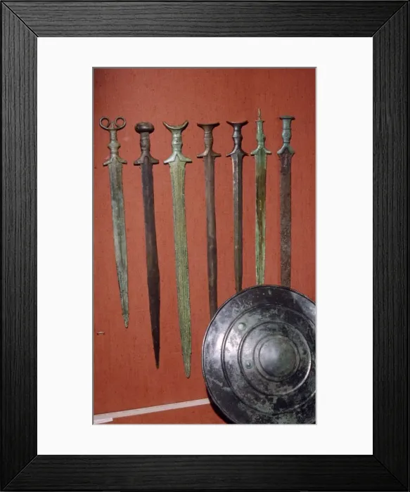 Framed Print : Bronze Swords and Shield from Bavaria. South Germany, 12th-8th century BC Framed Print : Bronze Swords and Shield from Bavaria. South Germany, 12th-8th century BC