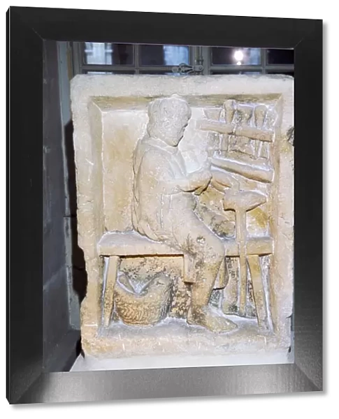 Roman relief of a shoe-maker or repairer from Rheims, France, c1st-2nd century