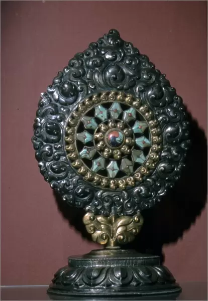 Tibetan Wheel of the Law inlaid with turquoise and coral