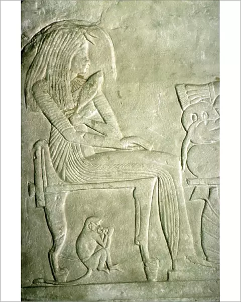 Egyptian Relief. Seated Lady with elaborate hairstyle