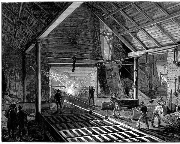 Tapping a blast furnace and running molten iron into the pigs, c1885