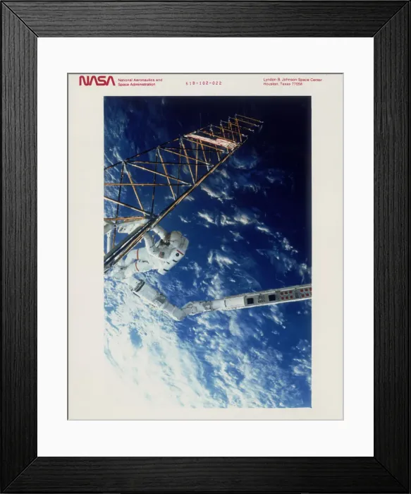 Framed Print : Astronaut on EVA from the Space Shuttle Atlantis, 1985 Framed Print : Astronaut on EVA from the Space Shuttle Atlantis, 1985