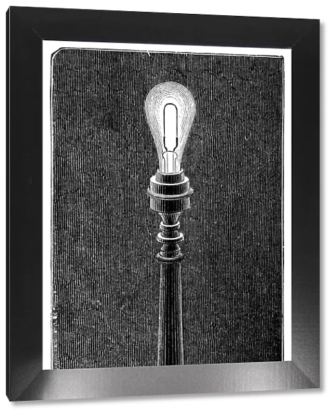 Edisons incandescent light globe in a table lamp fitting, 1891