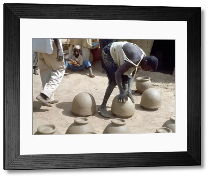 Framed Print : Making pots without a wheel, Nigeria, c1966 Framed Print : Making pots without a wheel, Nigeria, c1966