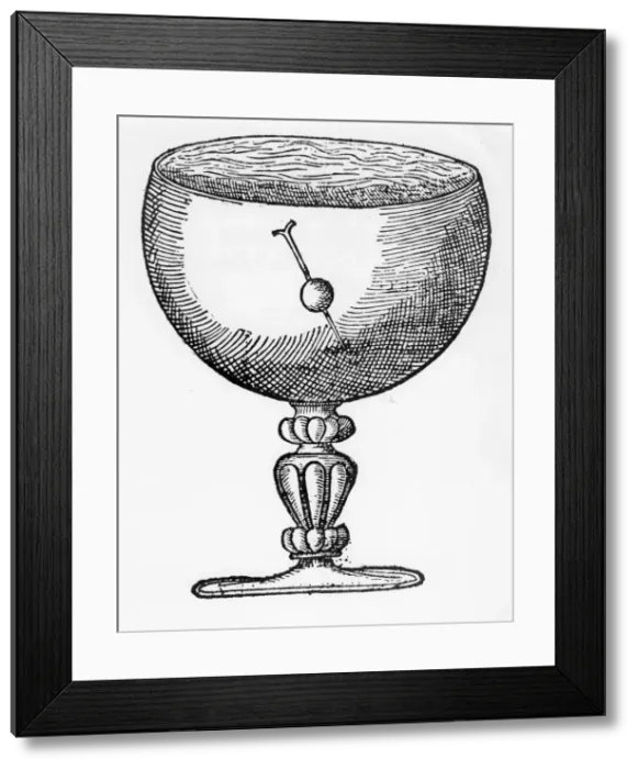 Framed Print : A magnetized needle pushed through a ball of cork, floating submerged in a goblet of water, 1600