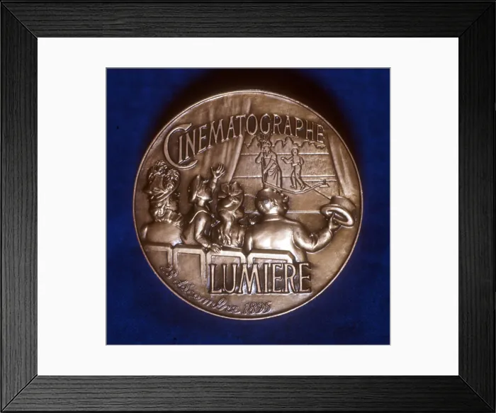 Framed Print : Reverse of medal commemorating 50 years of cinematography by the Lumiere brothers, 1945 Framed Print : Reverse of medal commemorating 50 years of cinematography by the Lumiere brothers, 1945