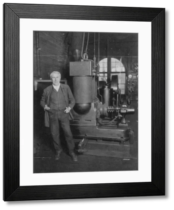 Framed Print : Thomas Alva Edison, American inventor, with his first dynamo for producing electric light, 1880s Framed Print : Thomas Alva Edison, American inventor, with his first dynamo for producing electric light, 1880s