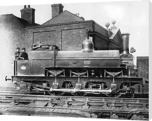 North Staffordshire 0-6-0 steam locomotive with driver and fireman on the footplate, 19th century