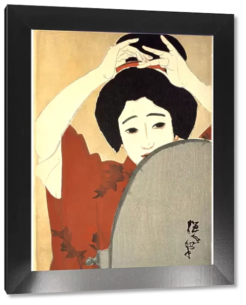 Woman Adjusting Her Hair in Front of the Mirror, 1930. Artist: Kitano Tsunetoni