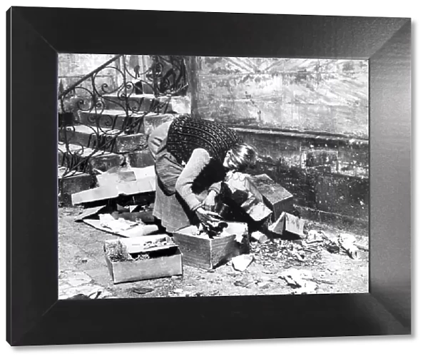 Woman scavenging for food, Bayreuth, Germany, April 1945