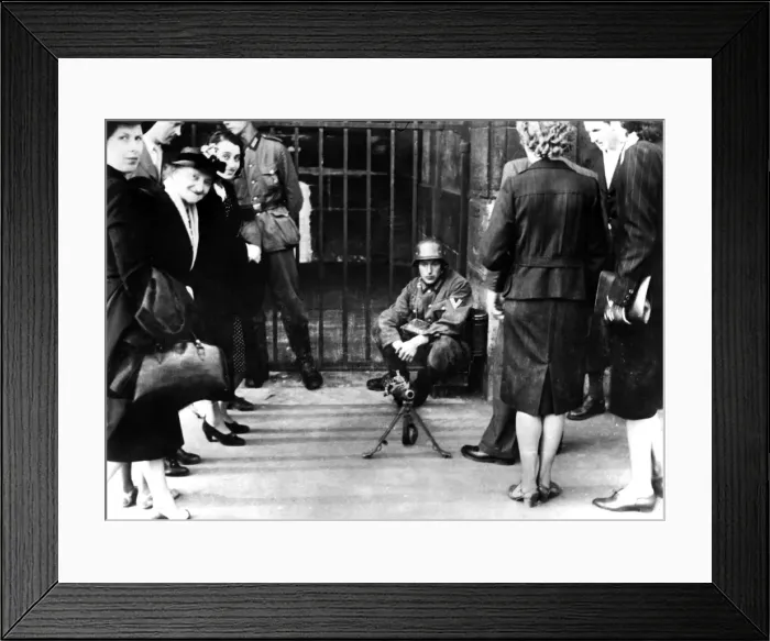 Framed Print : Civilians in front of a German guard post with a machine gun, Paris, June 1940 Framed Print : Civilians in front of a German guard post with a machine gun, Paris, June 1940
